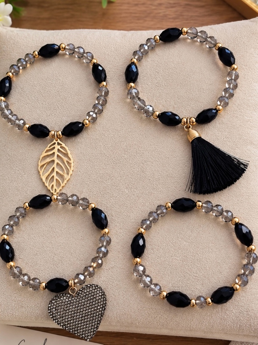 Black & Gray Beaded Bracelet Set with Gold Accents and Charms